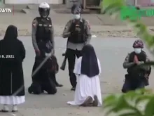 Catholic nun begs police not to shoot protesters during Myanmar unrest